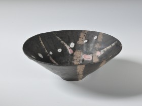 Mid 1980's. Manganese, wax resist, pink and white slip decoration. Reduction fired, cone 9