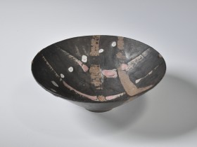 Mid 1980's. Manganese, wax resist, pink and white slip decoration. Reduction fired, cone 9